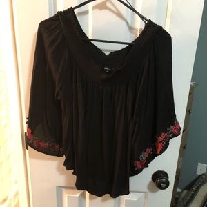 Off the shoulder black top with red roses